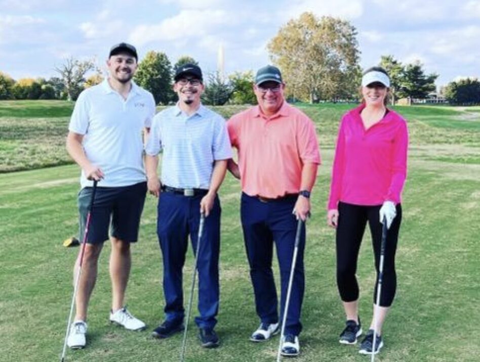 A foursome of new golfers